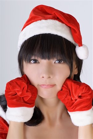 simsearch:400-04255437,k - Sweet Christmas girl of Asian, closeup portrait. Foto de stock - Super Valor sin royalties y Suscripción, Código: 400-04734866