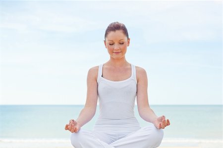 simsearch:400-04335941,k - Caucasian healthy woman doing yoga on beach Stock Photo - Budget Royalty-Free & Subscription, Code: 400-04734938