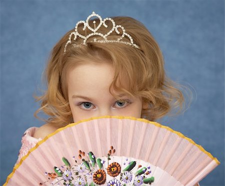 simsearch:400-04735006,k - Portrait of a young girl with an Oriental fan in the hands Stock Photo - Budget Royalty-Free & Subscription, Code: 400-04735001