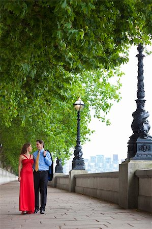 Romantic man and woman couple holding hands walking by the River Thames in London, England, Great Britain Stock Photo - Budget Royalty-Free & Subscription, Code: 400-04735659