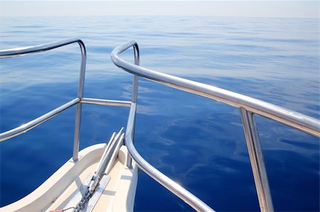 boat sailing blue calm ocean sea bow railing in Mediterranean Stock Photo - Budget Royalty-Free & Subscription, Code: 400-04736353