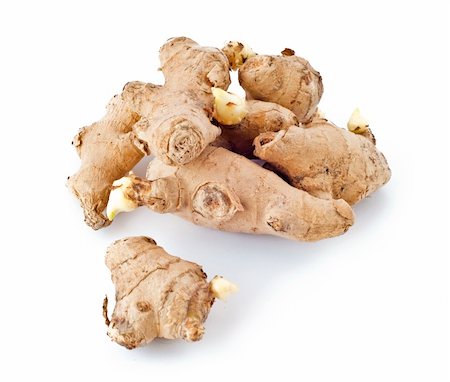 Some roots of ginger on white background Photographie de stock - Aubaine LD & Abonnement, Code: 400-04736429