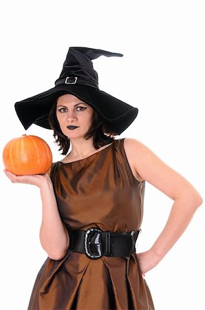 simsearch:400-06135836,k - Young witch with pumpkin  isolated on white background Stock Photo - Budget Royalty-Free & Subscription, Code: 400-04736643