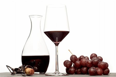 wine composition. wineglass, decanter, corkscrew and grapes Foto de stock - Royalty-Free Super Valor e Assinatura, Número: 400-04737327