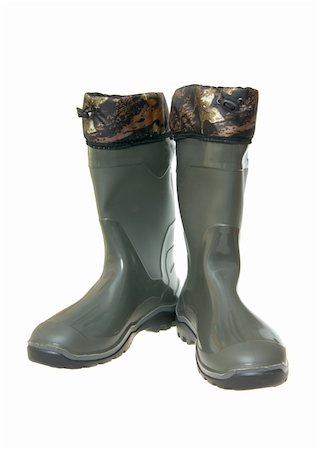 simsearch:400-05327098,k - Protective rubber boots of green color isolated on the white Stock Photo - Budget Royalty-Free & Subscription, Code: 400-04737991