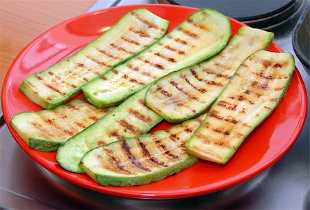 simsearch:400-05320343,k - grilled marrow slices served on red plate Stock Photo - Budget Royalty-Free & Subscription, Code: 400-04738328