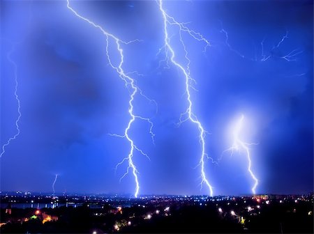 pic of electric shocked - Perfect thunderstorm and perfect Lightning over city Stock Photo - Budget Royalty-Free & Subscription, Code: 400-04738385