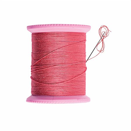 simsearch:400-04738418,k - Bright red thread bobbin with needle isolated on white Stock Photo - Budget Royalty-Free & Subscription, Code: 400-04738426