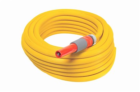 yellow garden hose coiled with spray nozzle Stock Photo - Budget Royalty-Free & Subscription, Code: 400-04738622