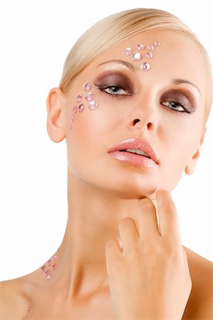 simsearch:400-04185400,k - blond young girl in a beauty portrait with creative make up and pink crystal stone on her face Fotografie stock - Microstock e Abbonamento, Codice: 400-04738817