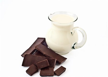 Dark chocolate and milk jug on a white background Photographie de stock - Aubaine LD & Abonnement, Code: 400-04738811