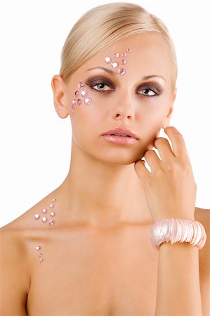simsearch:400-04185400,k - blond young girl in a beauty portrait with creative make up and pink crystal stone on her face Fotografie stock - Microstock e Abbonamento, Codice: 400-04738813