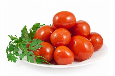 simsearch:400-04849937,k - Pickled red tomatoes with green parsley. Isolated on white background with clipping path. Stock Photo - Budget Royalty-Free & Subscription, Code: 400-04739005