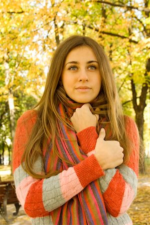 sunny_baby (artist) - Autumn portrait of a beautiful young woman against yellow leaves. The girl was wrapped in a scarf Foto de stock - Royalty-Free Super Valor e Assinatura, Número: 400-04739264