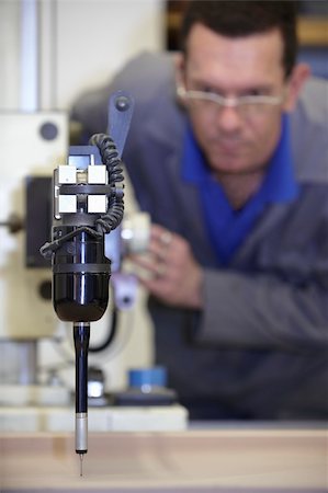 worker using a multisensor touch probe to inspect measurements Stock Photo - Budget Royalty-Free & Subscription, Code: 400-04739372