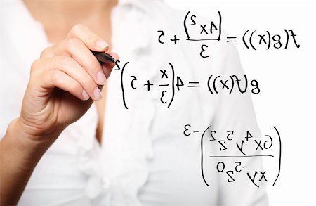 simsearch:400-05124201,k - A picture of a young teacher solving a mathematical equation over white background Stockbilder - Microstock & Abonnement, Bildnummer: 400-04739506