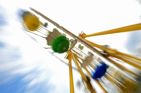 family pic on merry go round - Fun theme park abstract motion blur Stock Photo - Budget Royalty-Free & Subscription, Code: 400-04739570