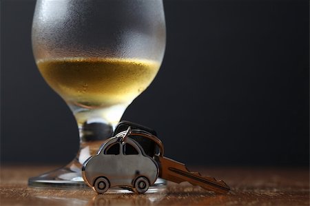 simsearch:400-04947548,k - Car key with car-shaped pendant and a glass of beer Stock Photo - Budget Royalty-Free & Subscription, Code: 400-04730340