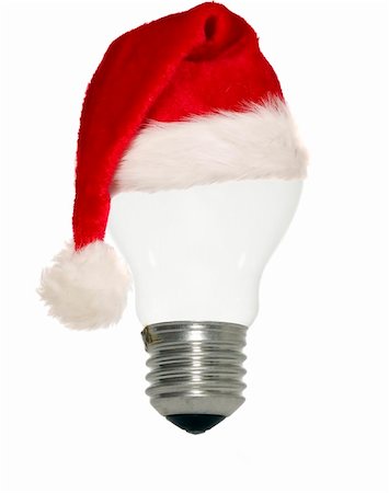 Light bulb with christmas cap on white background Stockbilder - Microstock & Abonnement, Bildnummer: 400-04731458