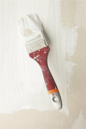 drywall - Renovation process: Brush in white paint on wall Stock Photo - Budget Royalty-Free & Subscription, Code: 400-04731497