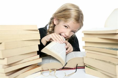 simsearch:400-08429355,k - little blond student girl eating her books with a funny gesture Photographie de stock - Aubaine LD & Abonnement, Code: 400-04731577