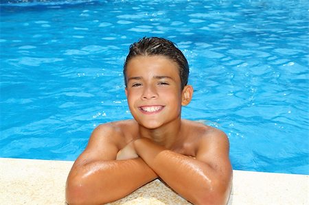 boy happy teenager vacation swimming pool blue water portrait Foto de stock - Super Valor sin royalties y Suscripción, Código: 400-04731598