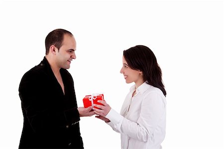 party couple on white background - Man giving a gift to a woman Stock Photo - Budget Royalty-Free & Subscription, Code: 400-04731974