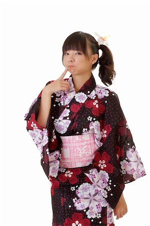 simsearch:400-05383537,k - Adorable Japanese girl with funny expression in traditional clothes. Stock Photo - Budget Royalty-Free & Subscription, Code: 400-04733124