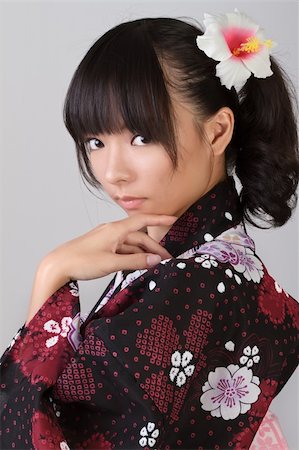 simsearch:400-05383537,k - Mysterious Japanese woman with attractive face, closeup portrait. Stock Photo - Budget Royalty-Free & Subscription, Code: 400-04733125