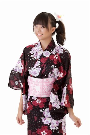 simsearch:400-05383537,k - Young Japanese girl smiling in traditional clothes against white. Stock Photo - Budget Royalty-Free & Subscription, Code: 400-04733123