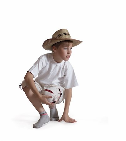 Sitting boy in straw hat on white background looking right. Foto de stock - Super Valor sin royalties y Suscripción, Código: 400-04733230