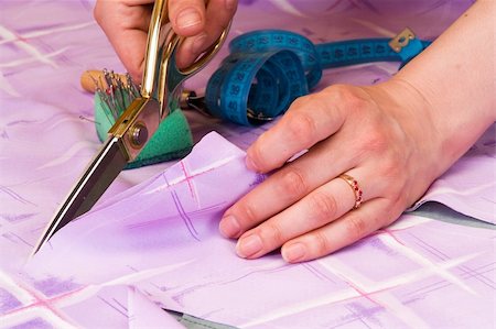 dressmaker cuts scissors fabrics Stock Photo - Budget Royalty-Free & Subscription, Code: 400-04744817