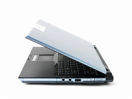 simsearch:400-05125337,k - A laptop computer isolated against a white backgroun d Foto de stock - Super Valor sin royalties y Suscripción, Código: 400-04744876