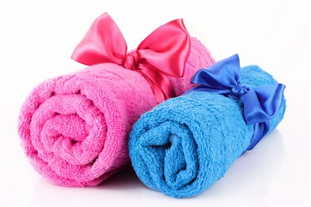 fabric white rolls - Twisted blue and pink towels with bands isolated on white Stock Photo - Budget Royalty-Free & Subscription, Code: 400-04745323