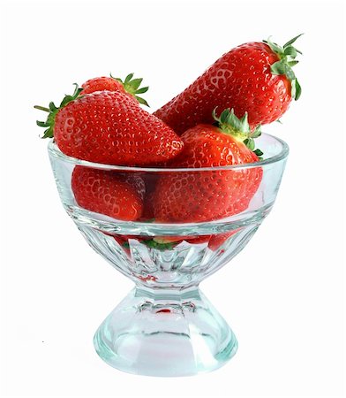 serezniy (artist) - Few strawberries in glass cup isolated on white Stockbilder - Microstock & Abonnement, Bildnummer: 400-04745627