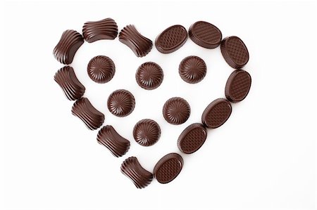 simsearch:400-05273247,k - Chocolates in love shape isolated on white Stock Photo - Budget Royalty-Free & Subscription, Code: 400-04745727