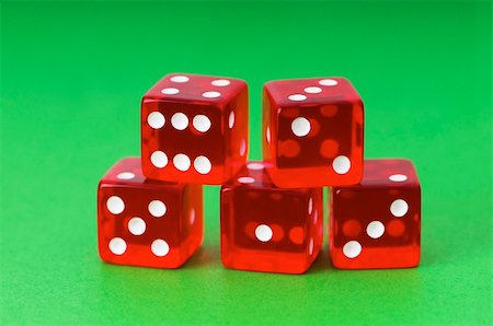 symbols dice - Red dice against green background Stock Photo - Budget Royalty-Free & Subscription, Code: 400-04745985