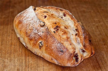 Loaf of Sourdough cranberry bread on cutting board. Stock Photo - Budget Royalty-Free & Subscription, Code: 400-04746058