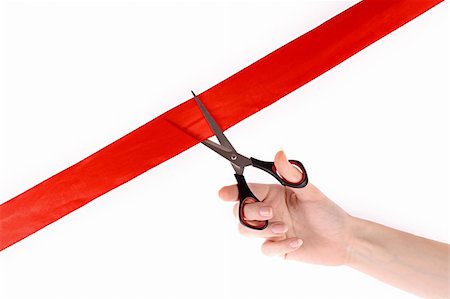 serezniy (artist) - Red ribbon, scissors and hand isolated on white Stockbilder - Microstock & Abonnement, Bildnummer: 400-04746827