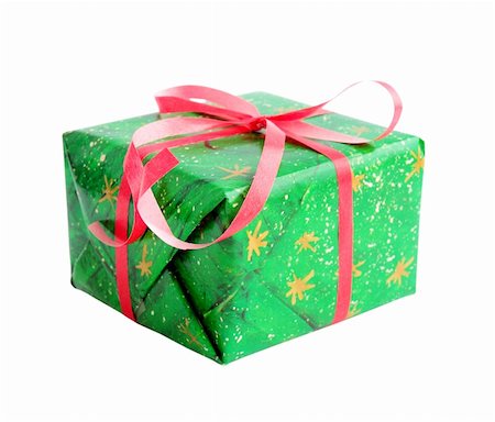 simsearch:400-06080917,k - Gift in the green wrapper on the white Stock Photo - Budget Royalty-Free & Subscription, Code: 400-04747599