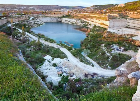 Evening abandoned half-flooded quarries in the vicinity of Sevastopol Tovn (Crimea, Ukraine) Stock Photo - Budget Royalty-Free & Subscription, Code: 400-04747695