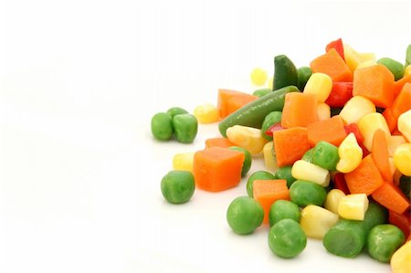 danicek (artist) - Colorful mix of cooked vegetable on white plate - pea, corn, carrot and green bean Foto de stock - Super Valor sin royalties y Suscripción, Código: 400-04747938