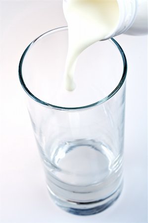 glass of milk with a bottle Stock Photo - Budget Royalty-Free & Subscription, Code: 400-04748042