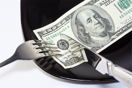 One hundred dollar banknote on a black plate with knife and fork Stock Photo - Budget Royalty-Free & Subscription, Code: 400-04749117