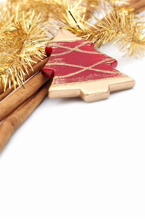 simsearch:400-06554049,k - Christmas ornament in the shape of Christmas tree with cinnamon sticks isolated on white background. Shallow dof Foto de stock - Royalty-Free Super Valor e Assinatura, Número: 400-04749460