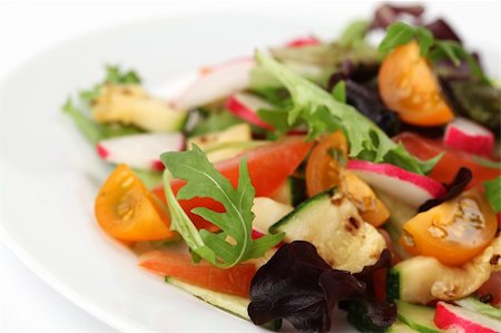 simsearch:824-07586096,k - Mixed greens with grilled zucchini, tomatoes, yellow cherry tomatoes, radish and cucumber. Shallow DOF Stock Photo - Budget Royalty-Free & Subscription, Code: 400-04749462