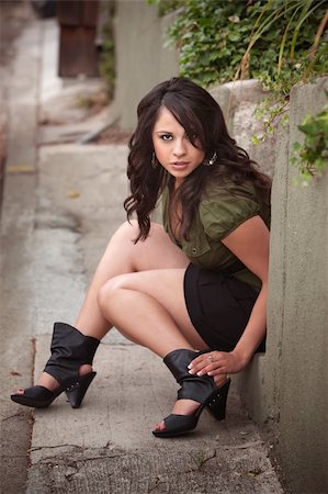 smiling young latina models - Pretty latina Woman Sitting on Step Outdoors Stock Photo - Budget Royalty-Free & Subscription, Code: 400-04749663