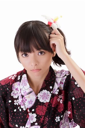 simsearch:400-05383537,k - Confused young girl of Asian with japanese traditional clothes. Stock Photo - Budget Royalty-Free & Subscription, Code: 400-04740207