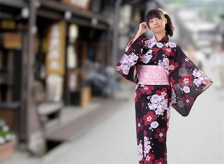 Japanese girl walking on street with blurred background. Stock Photo - Budget Royalty-Free & Subscription, Code: 400-04740201