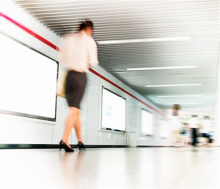 Woman in high heel shoes walking down a corridor, blurred motion Photographie de stock - Aubaine LD & Abonnement, Code: 400-04740645